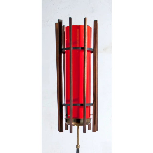 This original Vistosi floor lamp features a glass cylinder in bright orange-red Murano glass, with a white inside to...