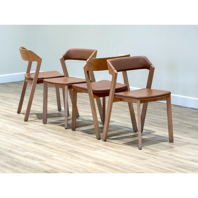 A quiet testament to enduring craft, this set of four Merano chairs by Ton brings together the poetry of tradition and the...