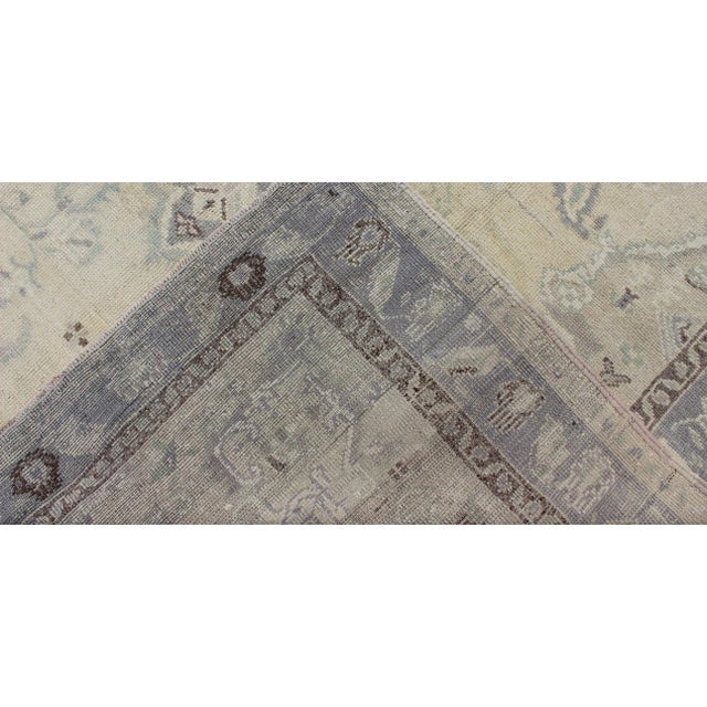 Cream Vintage Turkish Medallion Oushak in Muted Yellow, Blue, Green, Peach & Lilac For Sale - Image 8 of 9