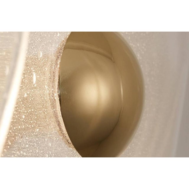 Curve constellation pendant lamp by jennifer midoz dimensions: ø 60 x w 90 cm materials: bubble-blown glass and pale gold...