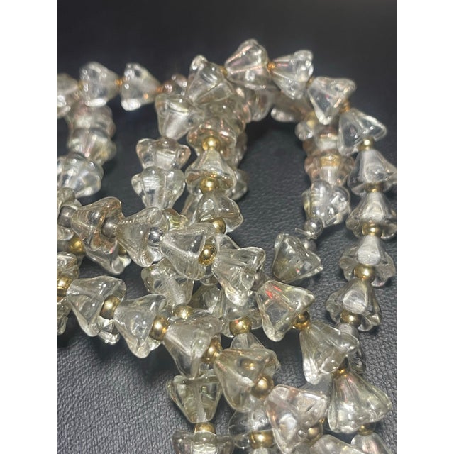 Bohemia 1950s Long Fluted Necklace Features Transparent, Mold-Pressed Glass Bellflower in Jablonec Nad Nisou (Gablonz) Czechoslovakia For Sale - Image 4 of 8