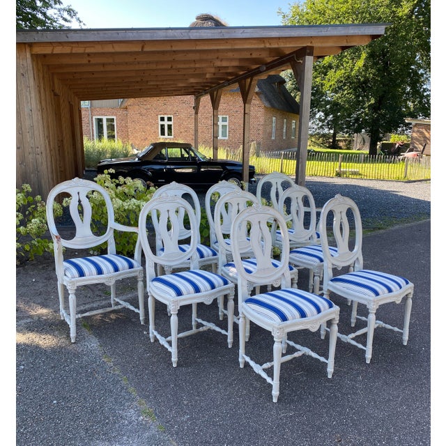 A large set of Gustavian chairs from around 1900. These include two armchairs and eight dining room chairs. The pieces of...