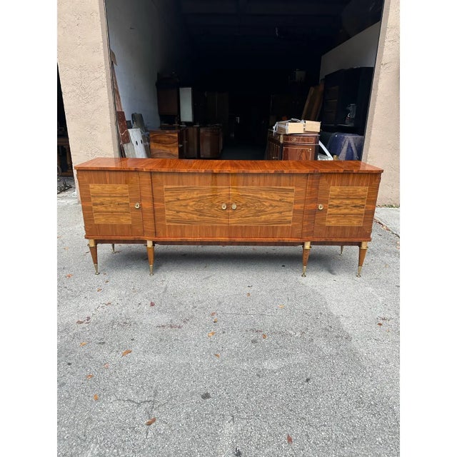 French art deco burlwood sideboard circa 1940s. The sideboard is in very good condition, 4 doors sideboard, three drawers...