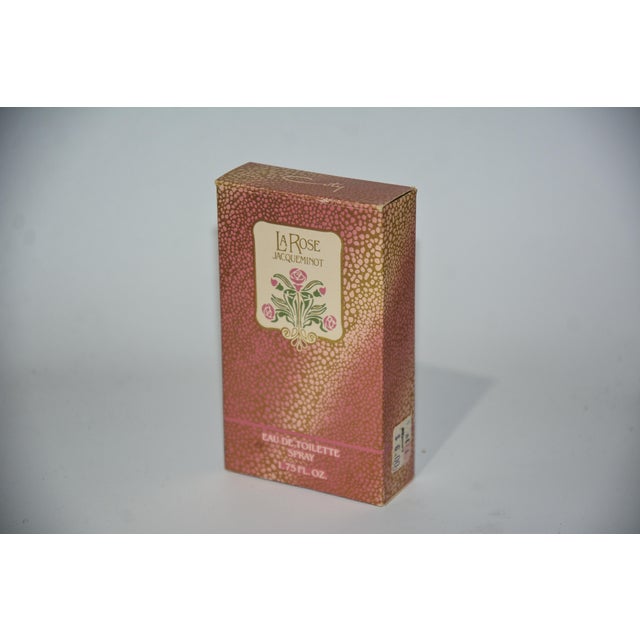 This elegant vintage perfume presentation features La Rose Jacqueminot, a classic floral fragrance produced by Coty. The...