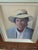 Here's a nicely done portrait circa Mid 20th Century of a young man sporting a hat. This is handsomely framed and would...