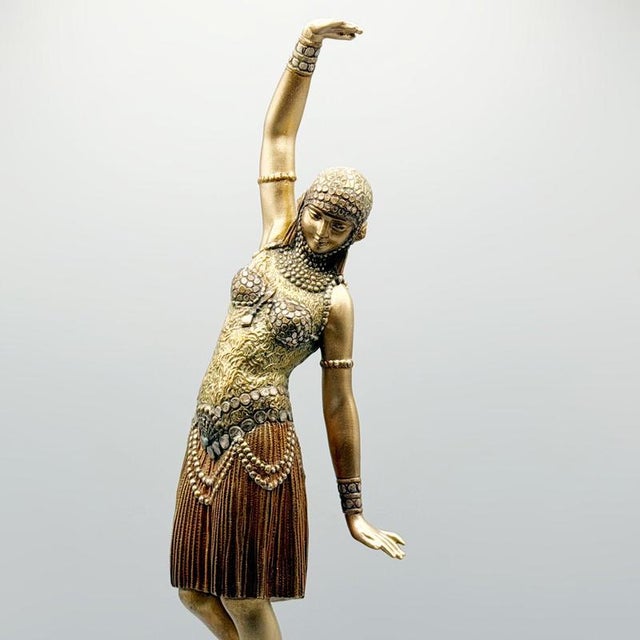 Dancer of lebanon' an art deco sculpture by demetre chiparus (1880-1947). A gilt bronze study of a dancer in exotic...