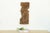 This piece shares real kinship with the sage-and-turtle panel just before it, same rustic, hand-worked carving style, same...