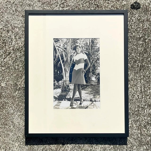 A fantastic vintage 70s black and white photograph. A chic fashion shot with a tropical look. Newly framed with a clean...
