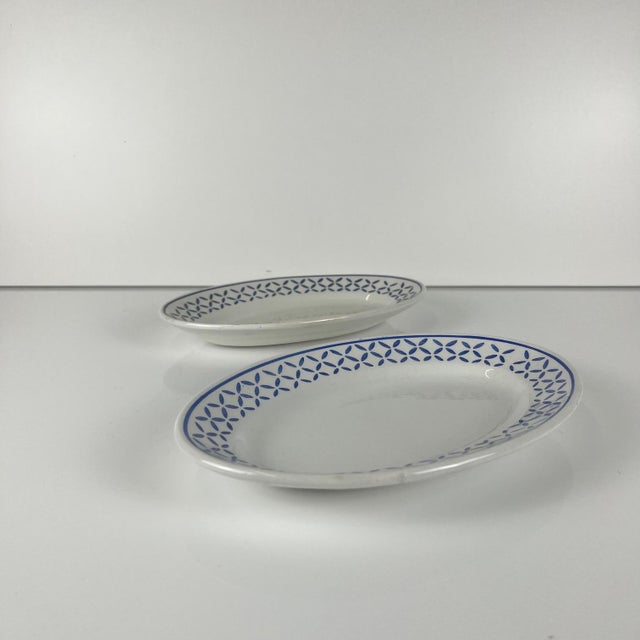 Pair of KG Lunéville "Kleber" model ramekins, mid-20th century Blue geometric pattern Dimensions: 22 x 15 cm Height: 2.5...