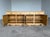 Striking Danish Modern oak sideboard produced by Hundstrup Møbelfabrik, Denmark, circa 1970s. Crafted in solid oak and oak...