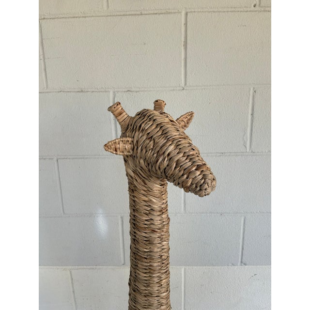 Stylish Tall Handwoven Giraffe Sculpture. Warm tan/beige tones. Intricate braided texture. Tall , slender silhouette,...