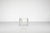 "LC1" armchair in white leather on a metal frame. Designed by Le Corbusier, Charlotte Perriand, and Pierre Jeanneret for...