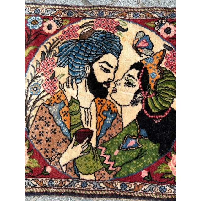 Nice mid century small pictorial rug with beautiful romantic design of lovers and flowers around, with beautiful colours,...