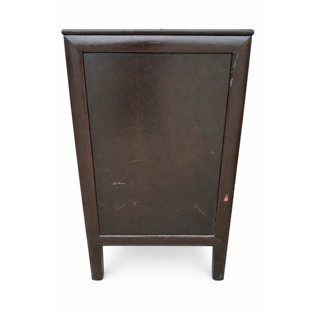 Vintage mid-century modern credenza attributed to designer Renzo Rutili, circa 1950s. This striking four-door credenza...