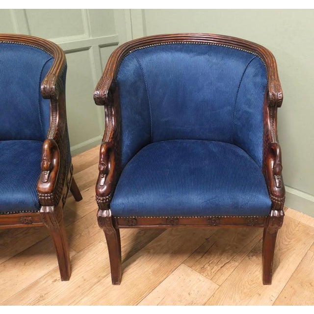 This wonderful duo has curved backs giving the chairs a cosy wrap around shape they are upholstered in a soft and tactile...