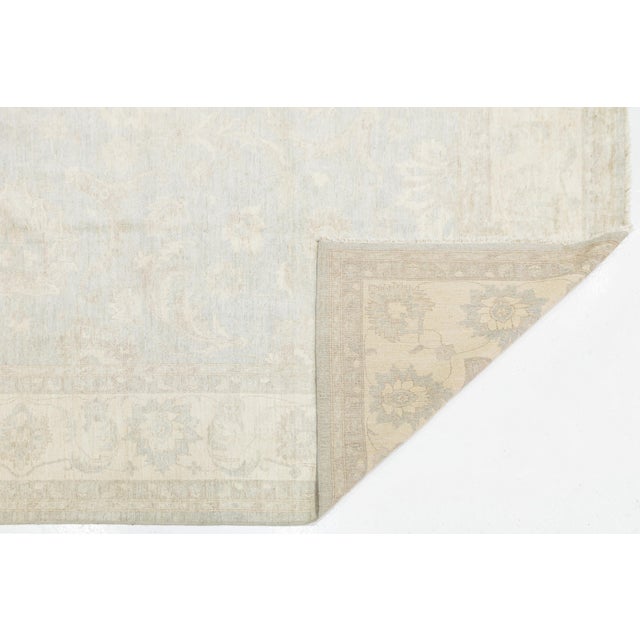 Elevate your space with this stunning Hand-Knotted Peshawar Wool Rug, featuring a sophisticated Modern design. Crafted...