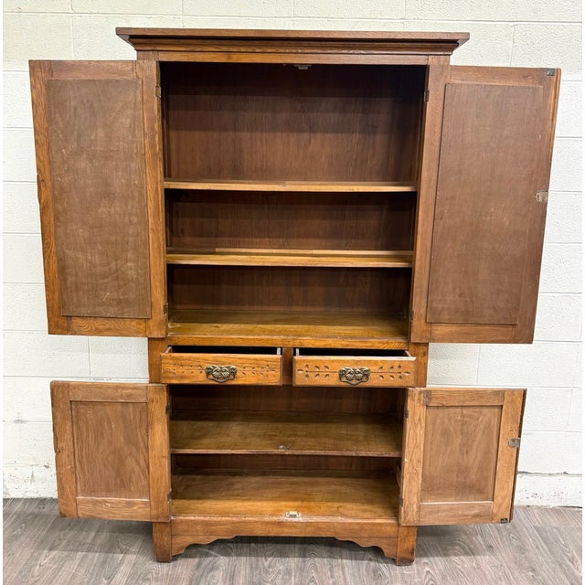 This is a gorgeous antique Victorian Early American pie safe crafted from solid quarter-sawn oak, dating to the late 19th...