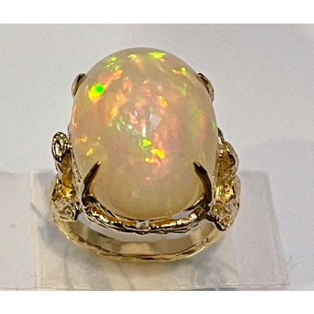 2010s 10 Carat Oval Shape Ethiopian Opal Cocktail Ring 14 Karat Yellow Gold For Sale - Image 5 of 18
