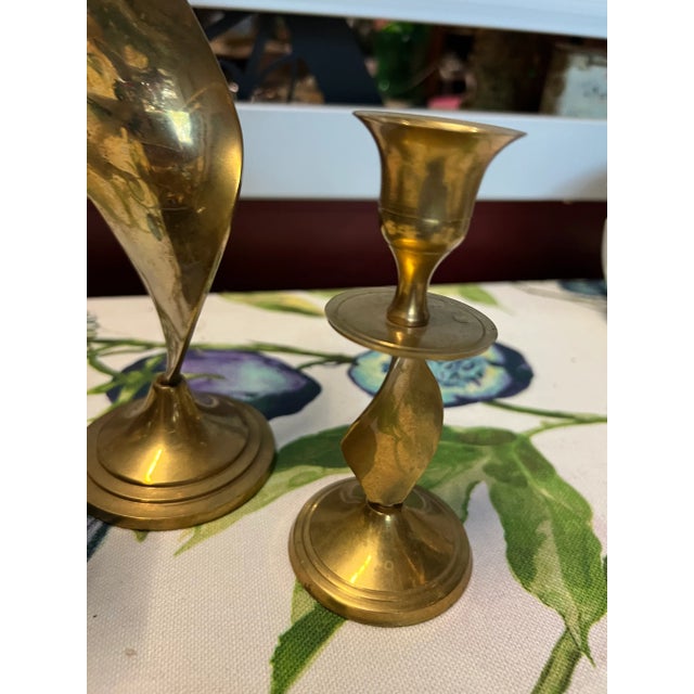 Great collection of vintage brass candle holders. Great twisted brass design! Perfect for any decor! Please check out my...