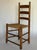 1900s antique ladder back chair with original woven seat. Incredible little side chair.