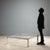 Center coffee table from the 1970s, featuring a minimalist design typical of the era. The structure is made of metal while...