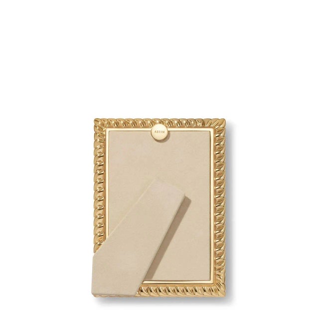 Presented in a classic gold finish, the Loretta picture frame is perfectly proportioned, with a twist design that provides...