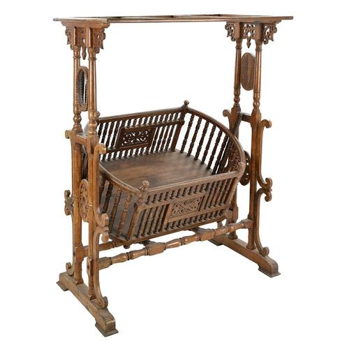 This 20th century wooden cradle is a true antique gem, ideal for adding a touch of elegance and authenticity to your...