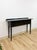 This clean and well-made Nichols and Stone solid black wood console is a sleek and versatile modern transitional entryway...