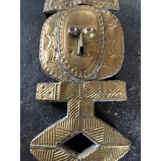 Early Kota Reliquary Figures were created to guard the bones of family ancestors. They were thought to hold great...