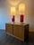 Nice pair of red glazed ceramic & brass table lamps by Kate Spade. Originally purchased at Neiman Marcus. Height 37" Width...