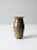 A studio pottery vase dated 2017, hand-crafted with a slender, elegant silhouette. The surface features a striking green...