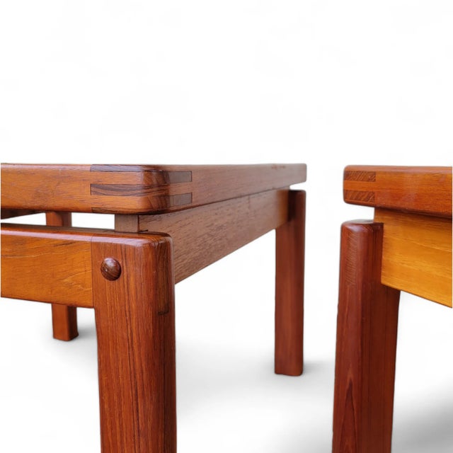 Kristiansen & Thomassen of Denmark SET of two tables, in solid teak with inset glass tops. These gorgeous tables are from...