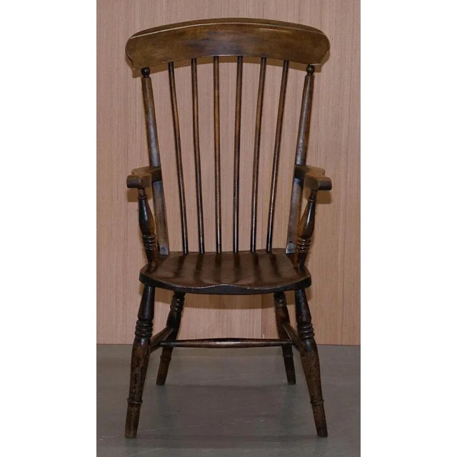 We are delighted to offer for sale this stunning 19th century Elm Thames Valley Windsor armchair with traces of original...