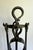This vintage wrought iron fireplace set features a beautifully sculptural design with hammered textures, oversized loop...