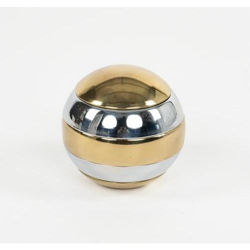 Midcentury globe shaped stackable ashtrays or bowls in chrome and brass in the style of the Italian designer Tommaso...