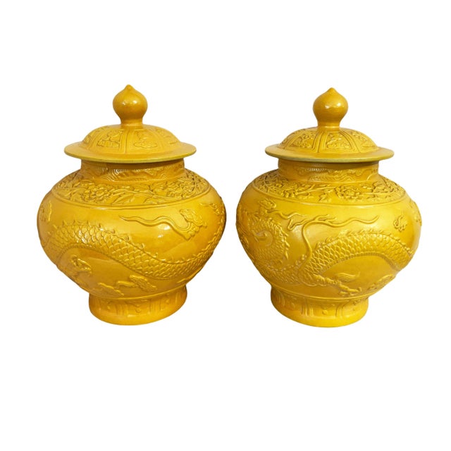 Superb pair of large Chinese Dragon imperial yellow glaze porcelain lidded ginger jars, sumptuously hand carved ,...