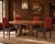 A handsome bespoke set of ten signed Ralph Lauren Home “Noble Estate” dining side chairs, executed in a dramatic...