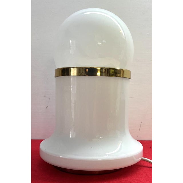 Reggiani table lamp 70s in excellent condition of opal retention healthy chrome with some original cable stains Lamp...