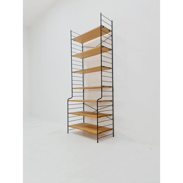 Freestanding vintage string bookshelf in eshe , 1950s by whb germnay dimensions: 41 d x 73 w x 189 h cm it is in good...