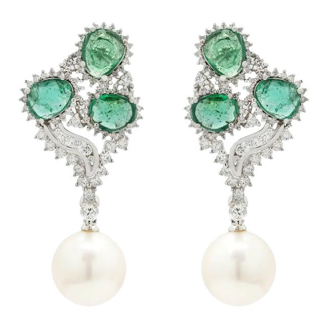 This is part of Chairish’s Fine Jewelry assortment. Emerald, Pearl and Diamond Dangle Earrings to make a statement with...