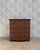 Elegant and timeless, this large antique english chest of drawers captivates with its generous proportions and the warmth...