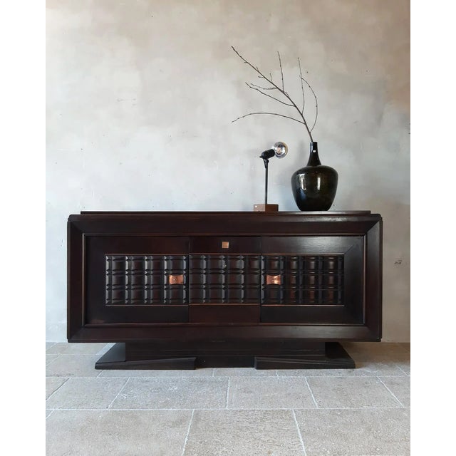 Vintage design sideboard by charles dudouyt in dark oak, 1940s-50s. The doors of this beautiful credenza are cut out in...