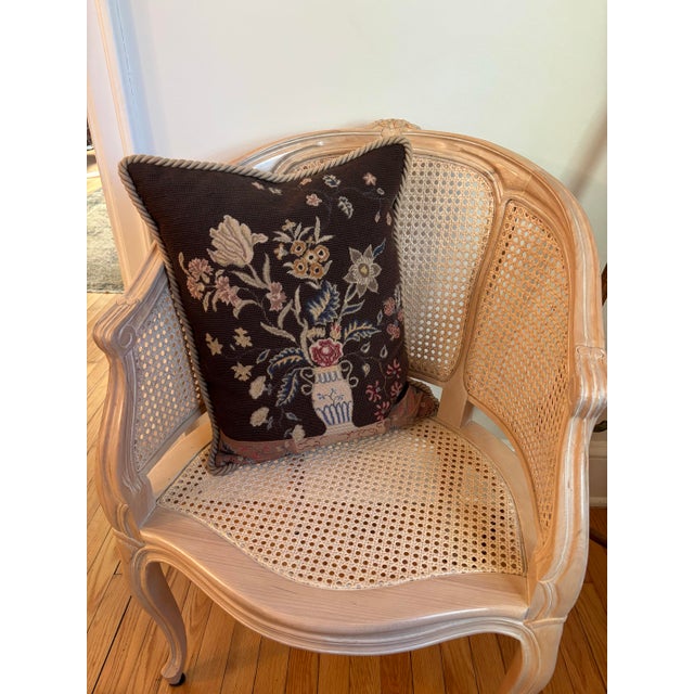 Beautiful mid-20th century needlepoint pillow with cord trim, velvet back and a feather down insert. Most items found at...