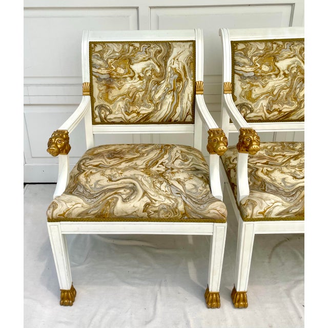 Here is a fabulous set of FOUR armchairs in the Traditional French Empire style featuring amazing lion heads on the front...