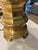 This is a vintage solid brass table lamp. It has a nice patina and bronze tone. The original harp and finial is in place....