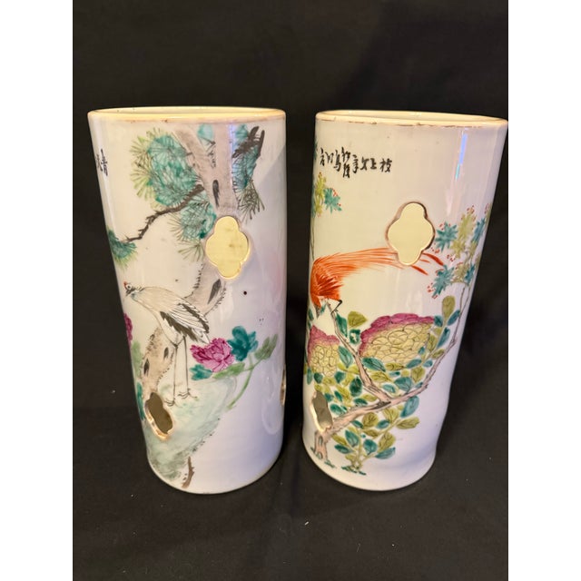 Charming vintage mid-20th century Chinese famille rose porcelain three-piece garniture set, hand-painted in the classic...