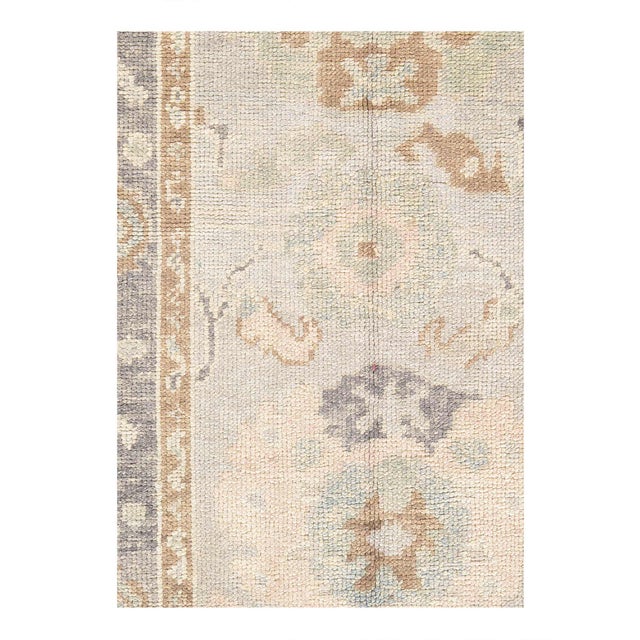 Hand knotted Turkish Oushak rug made of 100% hand-spun lamb's wool rug and all natural dyes. Each rug has a dense, soft...