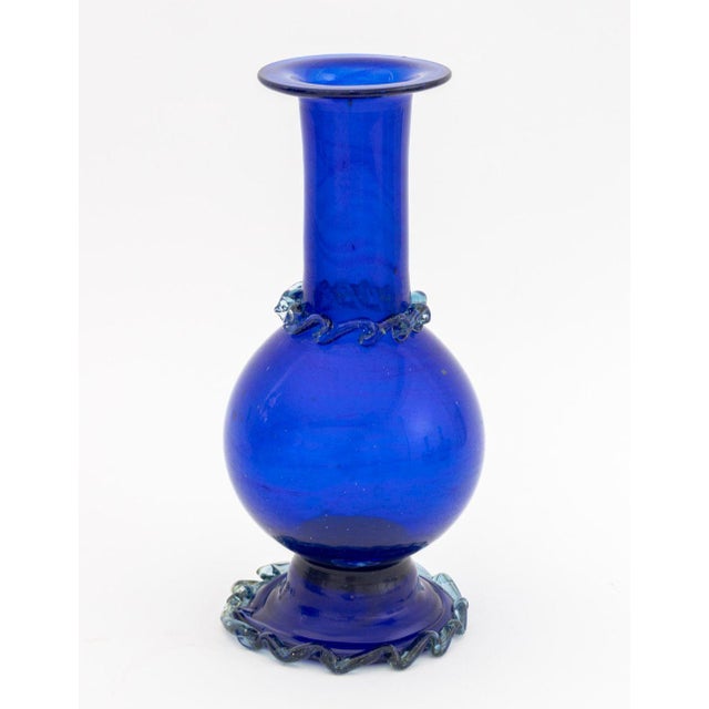 Group of Four Murano Cobalt Blue Art Glass Articles, comprising: a gold-flecked glass vide poche, a baluster vase with...