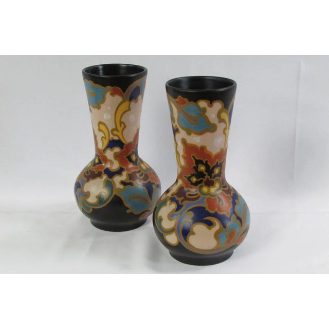 Pair of vases signed Regina, n° 226 Rosario, Gouda Holland, period :1945-1970, in perfect condition. Dimensions : Height :...