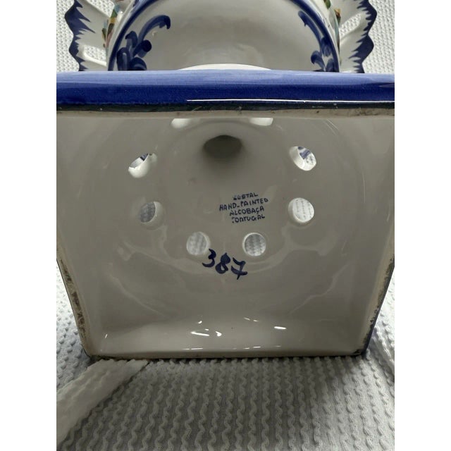 Portuguese Alcobaça Ceramic Reticulated Pedestal Dish – Blue & White, 9"x9" Add a touch of classic European charm to your...